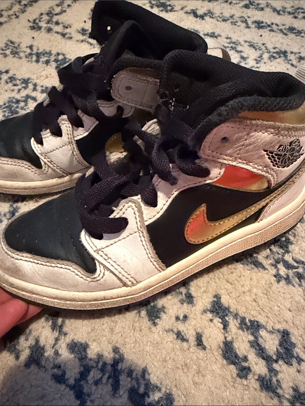 Nike Kids Black and White High-Top Sneakers with Orange-Gold Swoosh